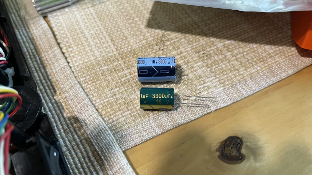 Old and new 3,300 µF 16 V Capacitors Side By Side